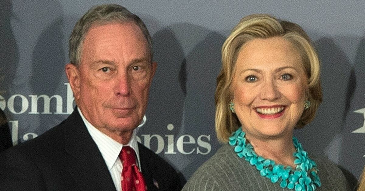 Former New York City Mayor Michael Bloomberg, left, and former Secretary of State Hillary Clinton are seen at Bloomberg Philanthropies on Dec. 15, 2014, in New York City.