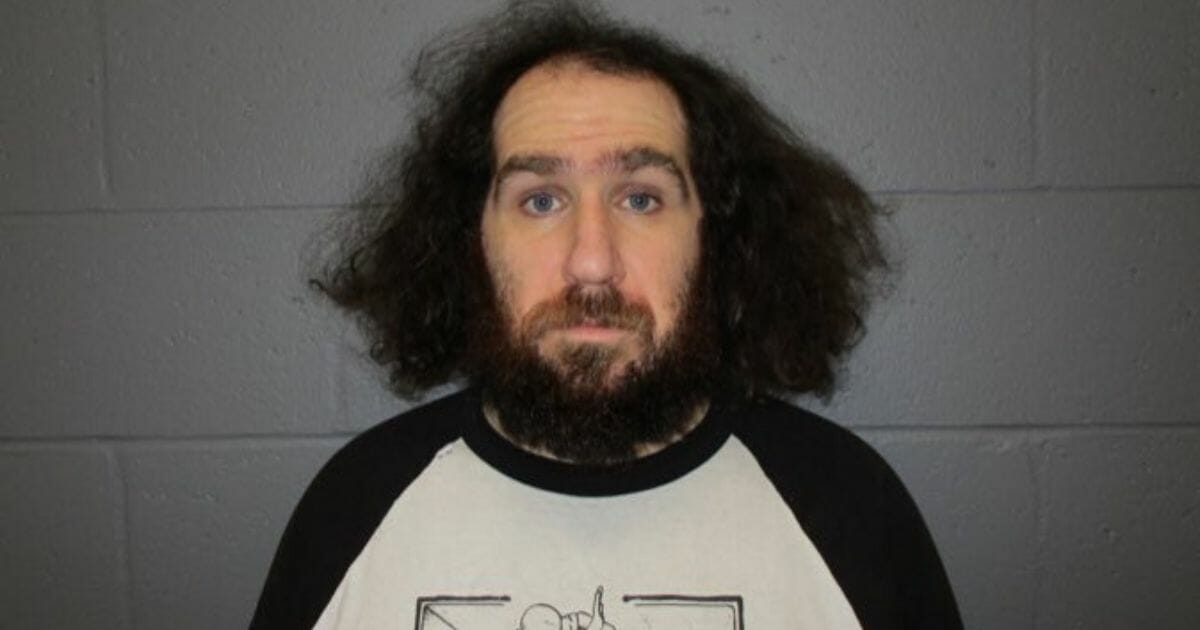 A New Hampshire man has been arrested for allegedly assaulting a 15-year-old Trump supporter and two adults at a polling site during the state's primary Tuesday.