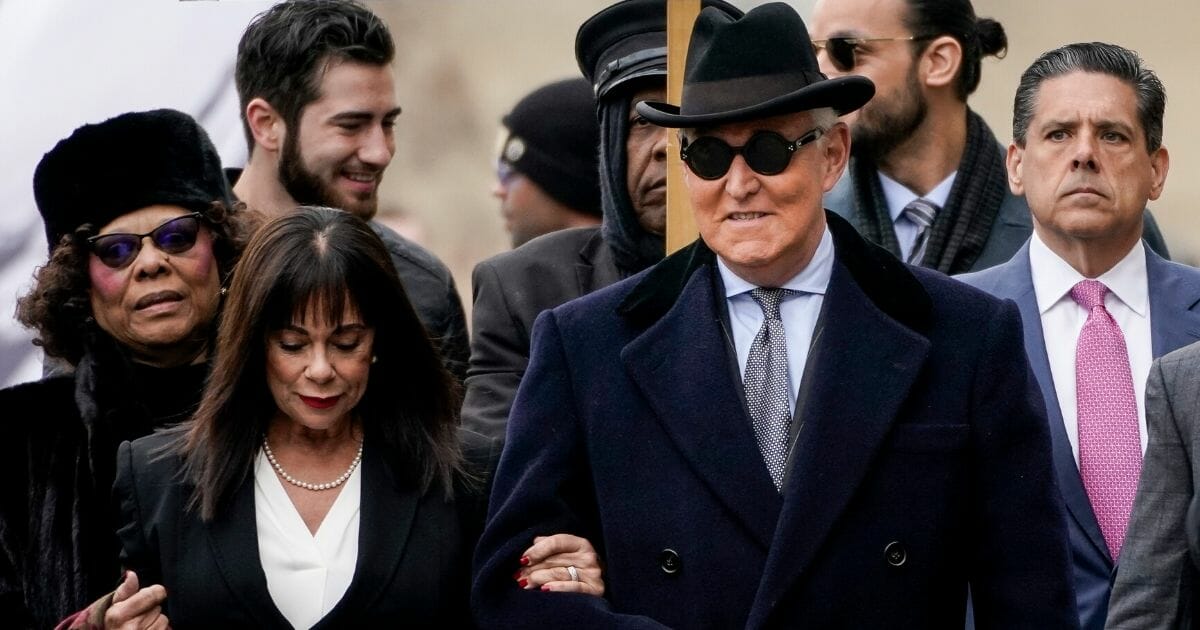 Roger Stone and his wife, Nydia, arrive at the E. Barrett Prettyman U.S. Courthouse in Washington on Feb. 20, 2020.