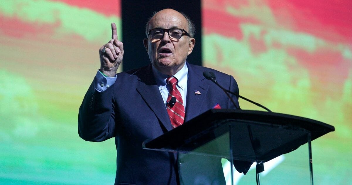 President Donald Trump's personal attorney, Rudy Giuliani, addresses the crowd at the Turning Point USA Student Action Summit on Dec. 19, 2019, in Palm Beach, Florida.