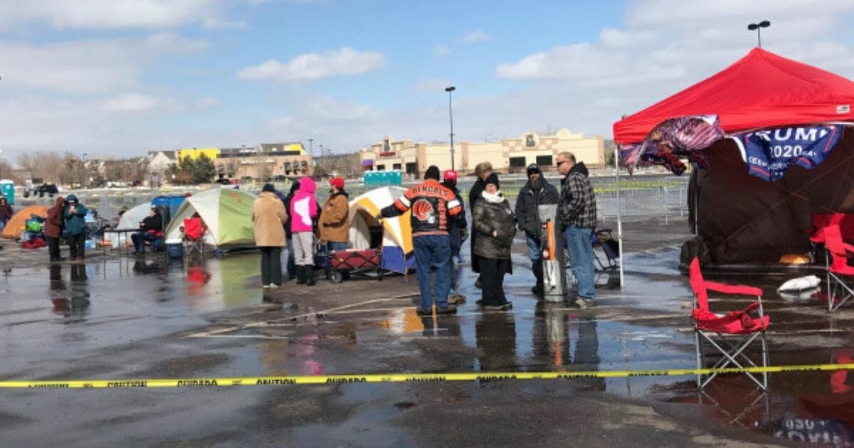 People camp out next to the Broadmoor World Arena in Colorado Springs, Colorado, before President Donald Trump's "Keep America Great" rally there on Feb. 20, 2020.