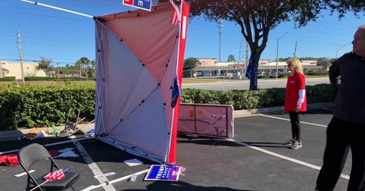 A tent set up by Republicans in Jacksonville, Florida, to enlist voters for President Donald Trump lies in shambles after the attack by a man who dislikes the president.