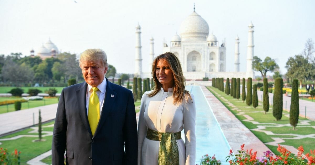 President Donald Trump and first lady Melania Trump pose during their visit the Taj Mahal in Agra, India, on Feb. 24, 2020.