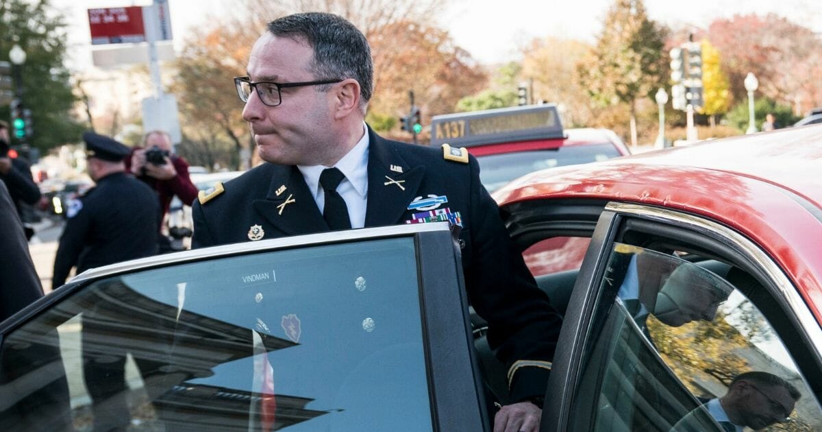 Lt. Col. Alexander Vindman exits the Longworth House Office Building after testifying before the House Intelligence Committee on Nov. 19, 2019.