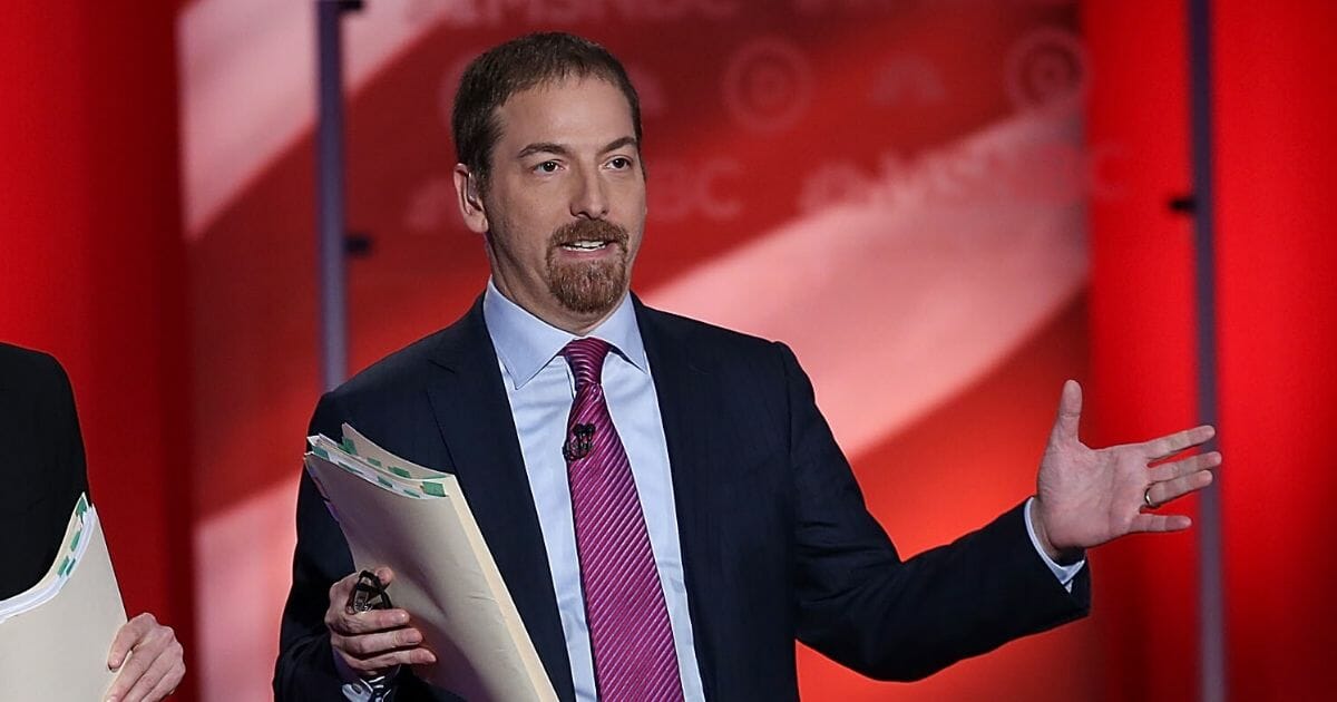 "Meet the Press" host Chuck Todd is pictured preparing to moderate the Feb. 4, 2016, primary debate between former Secretary of State Hillary Clinton and Vermont Sen. Bernie Sanders.