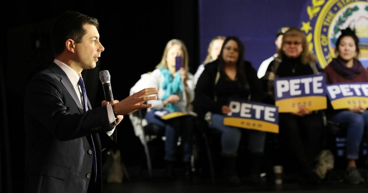 Democratic presidential hopeful Pete Buttigieg, the former mayor of South Bend, Indiana, greets supporters in Manchester, New Hampshire, the morning after the flawed Iowa caucus on Feb. 4, 2020.