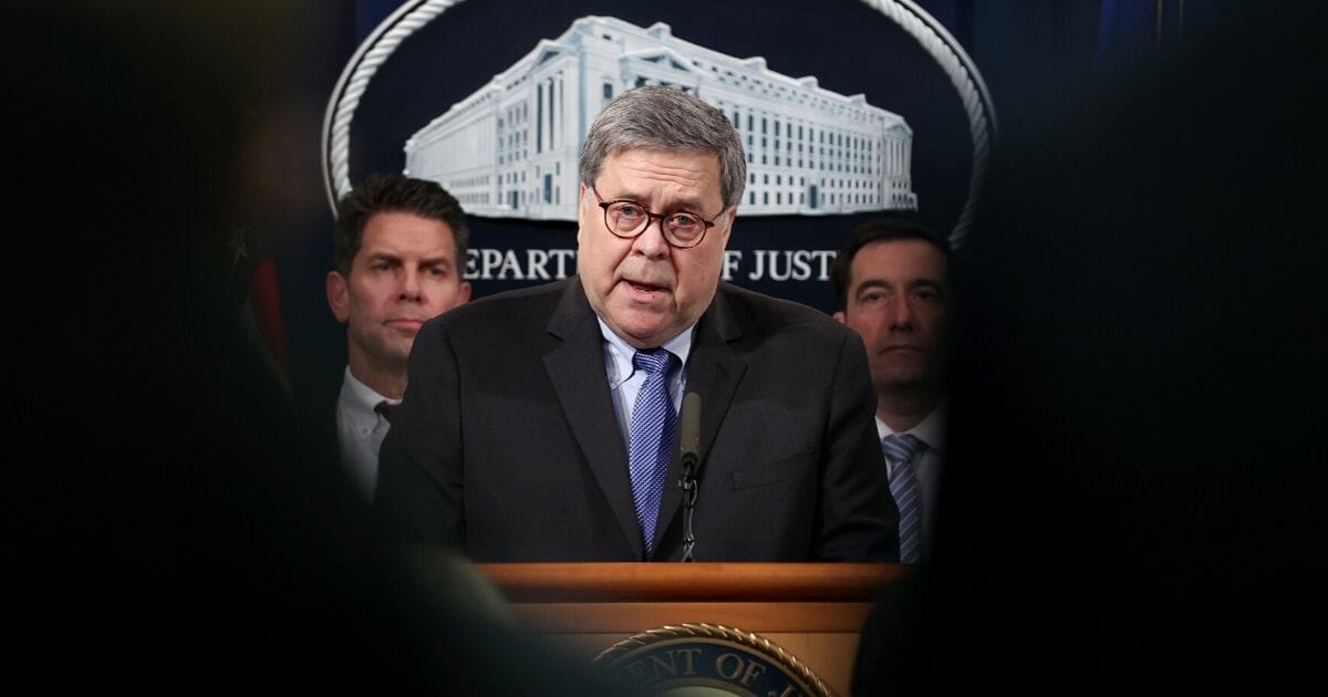 Attorney General William Barr speaks during a news conference on the shooting at the Pensacola naval base on Jan. 13, 2020, in Washington, D.C.