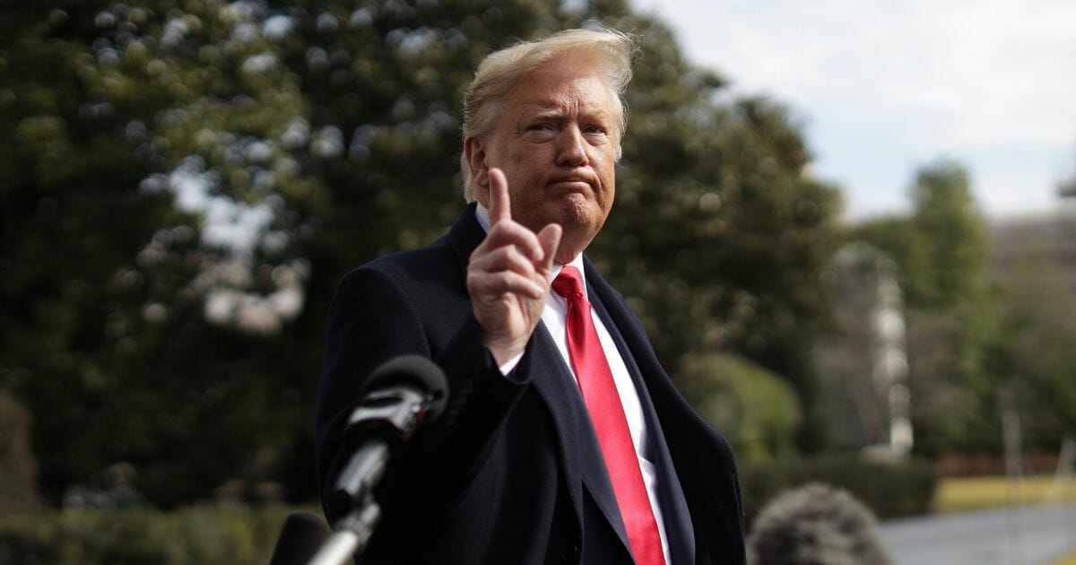 President Donald Trump speaks to members of the media prior to his Marine One departure from the White House on Feb. 7, 2020, in Washington, D.C.