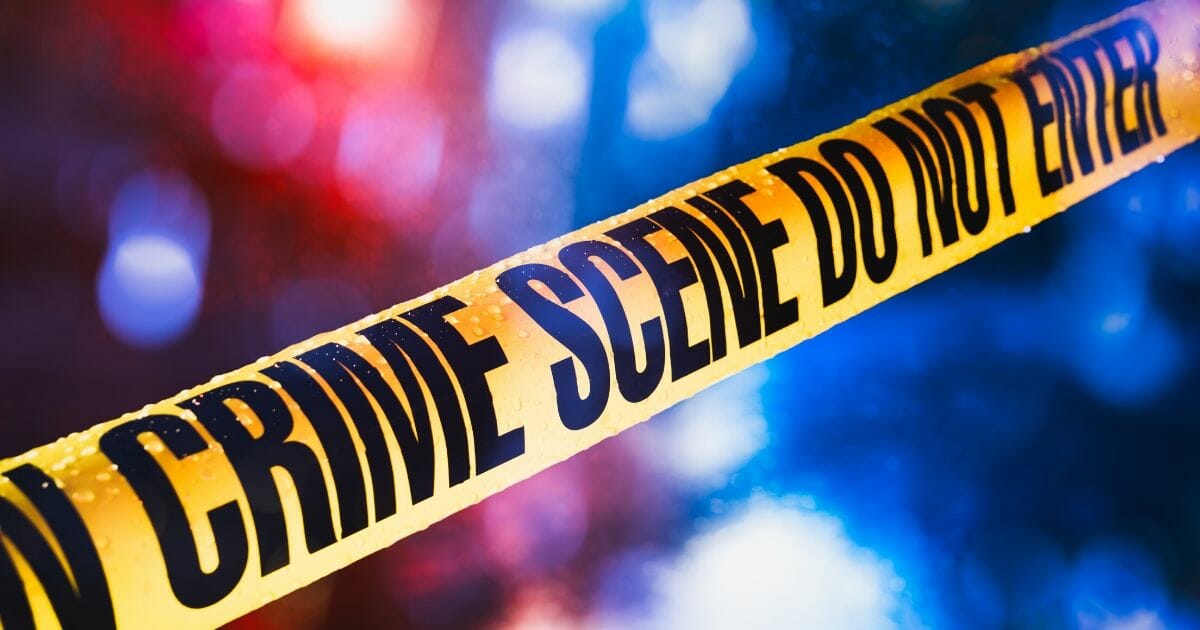 This stock image shows police tape at a crime scene.