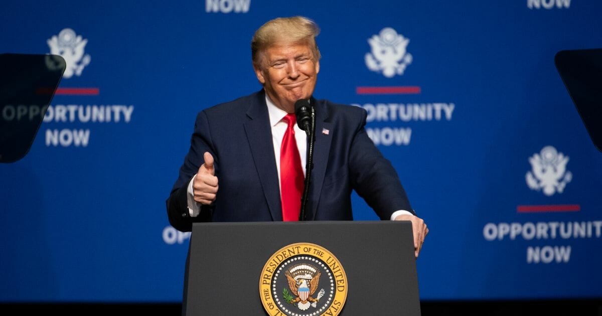 President Donald Trump gives his audience a thumb's up last week during a speech at Central Piedmont Community College in Charlotte, North Carolina.