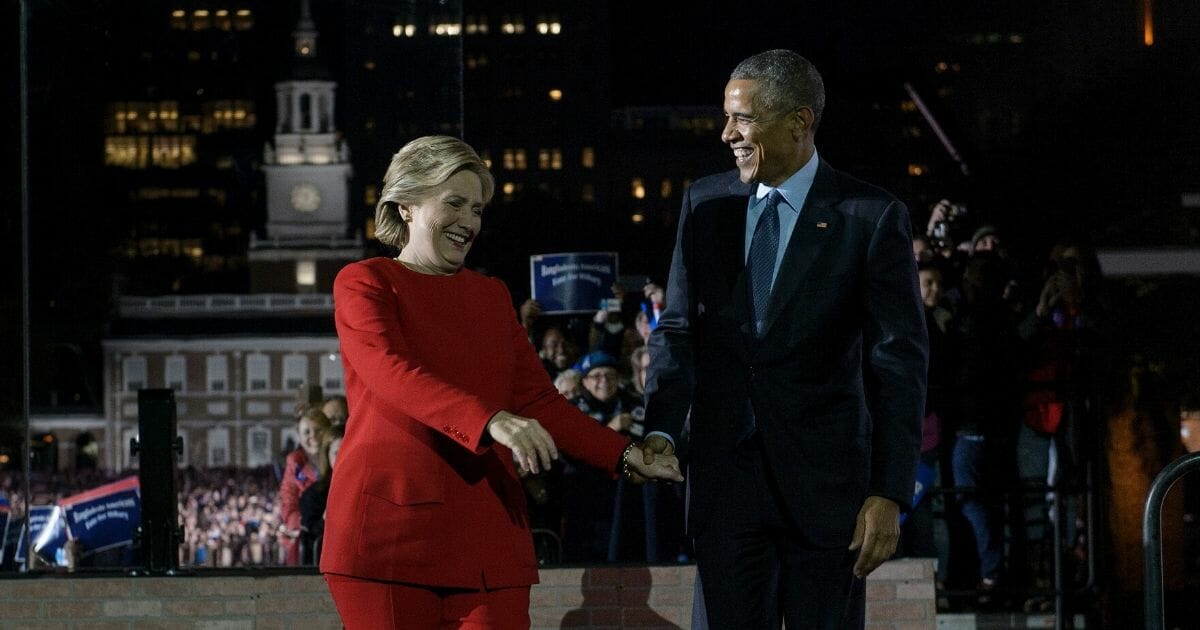 2016 Democratic presidential nominee Hillary Clinton is welcomed by President Barack Obama during a rally on the Independence Mall in Philadelphia on Nov. 7, 2016.