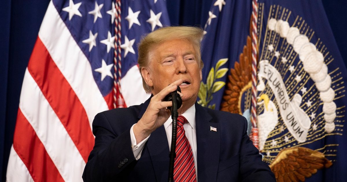 President Donald Trump addresses the National Border Patrol Council in Washington on Friday.