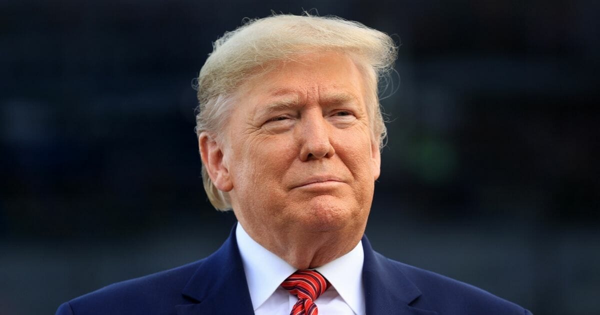 President Donald Trump looks on from the pit road prior to the NASCAR Cup Series 62nd Annual Daytona 500 at Daytona International Speedway on Feb. 16, 2020, in Daytona Beach, Florida.