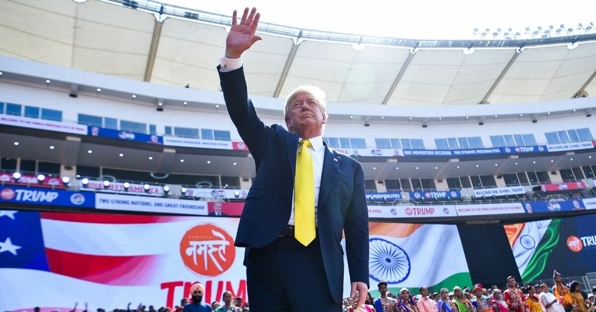 President Donald Trump waves after attending 'Namaste Trump' rally at Sardar Patel Stadium in Motera, on the outskirts of Ahmedabad, India, on Feb. 24, 2020.