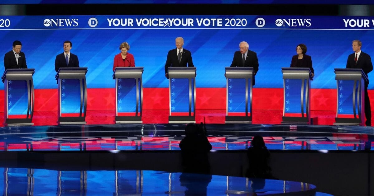Democratic presidential candidates before their party’s primary debate in the Sullivan Arena at St. Anselm College on Feb. 7, 2020, in Manchester, New Hampshire.