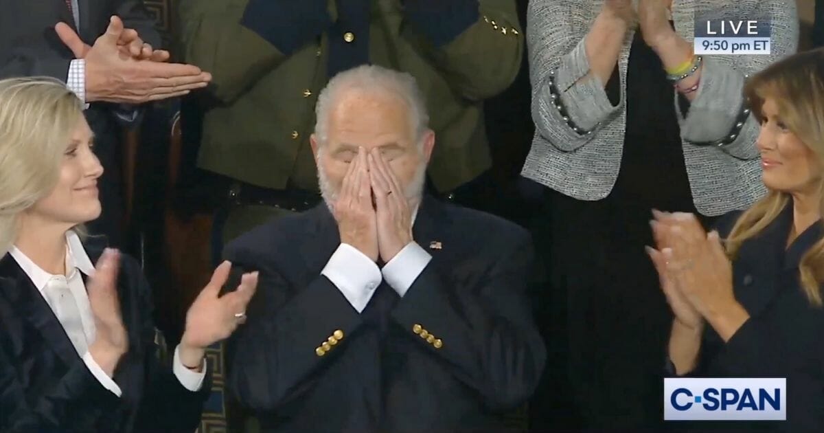 Conservative radio host Rush Limbaugh has an emotional response after President Donald Trump announces that he is being awarded the Presidential Medal of Freedom at the State of the Union address.