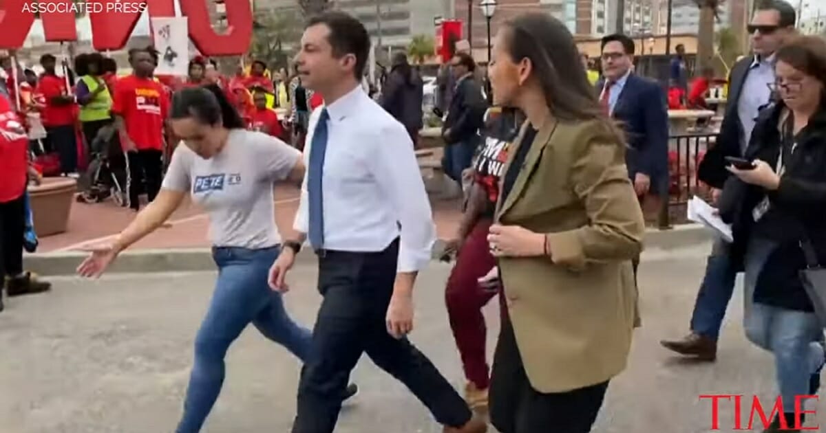 Democratic presidential contender Pete Buttigieg quickly leaves a union event in Charleston, South Carolina, on Monday that turned ugly for him.