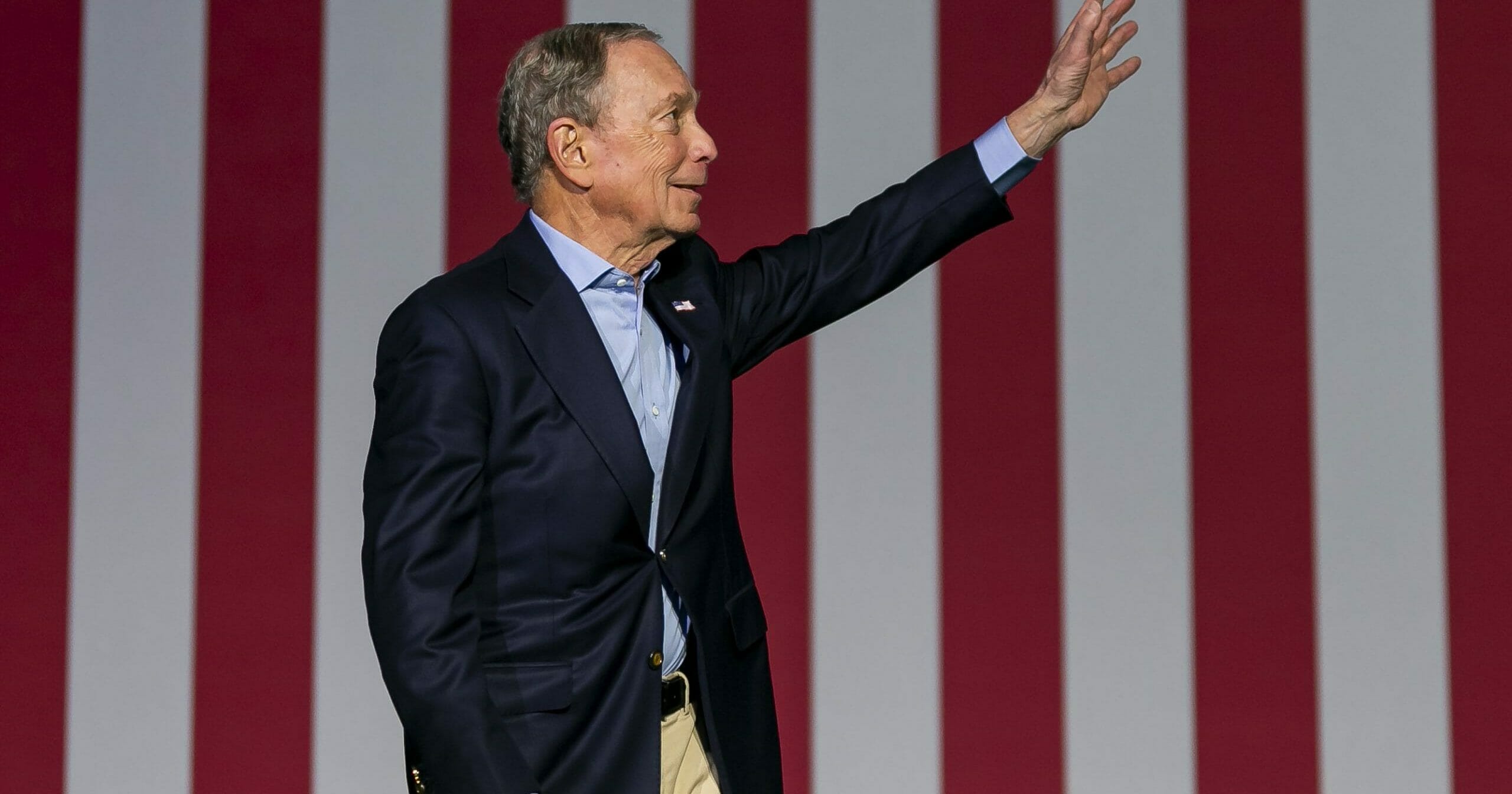 Democratic presidential candidate Mike Bloomberg waves to supporters as he arrives to his campaign rally at the Palm Beach County Convention Center in West Palm Beach, Florida, on March 3, 2020.
