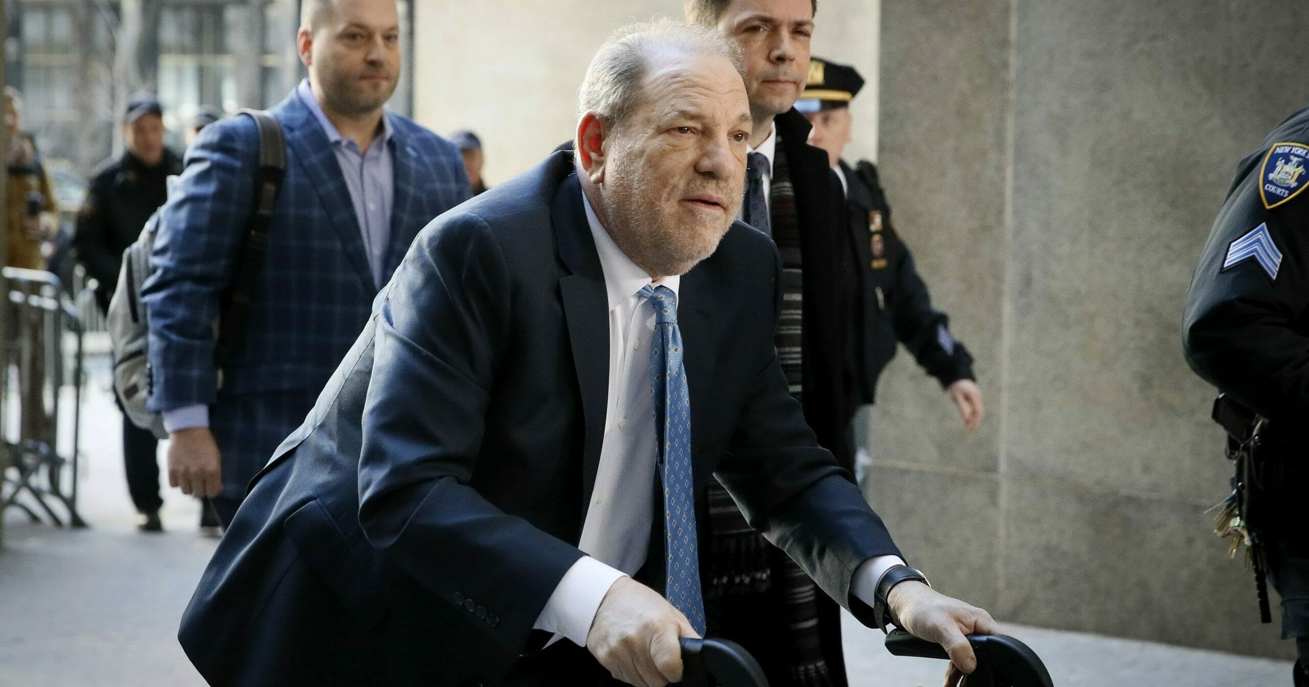 Harvey Weinstein arrives at a Manhattan courthouse as jury deliberations continue in his rape trial on Feb. 24, 2020, in New York.
