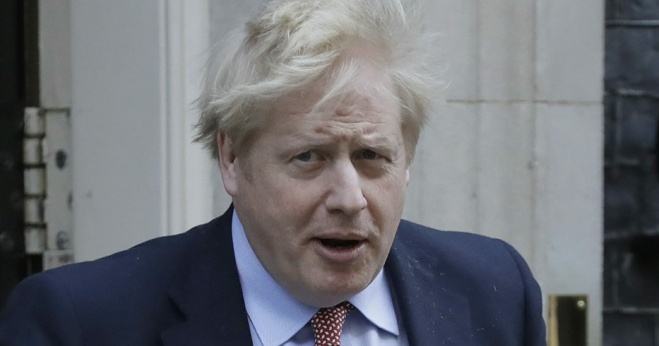British Prime Minister Boris Johnson leaves 10 Downing Street for the House of Commons in London on March 25, 2020.