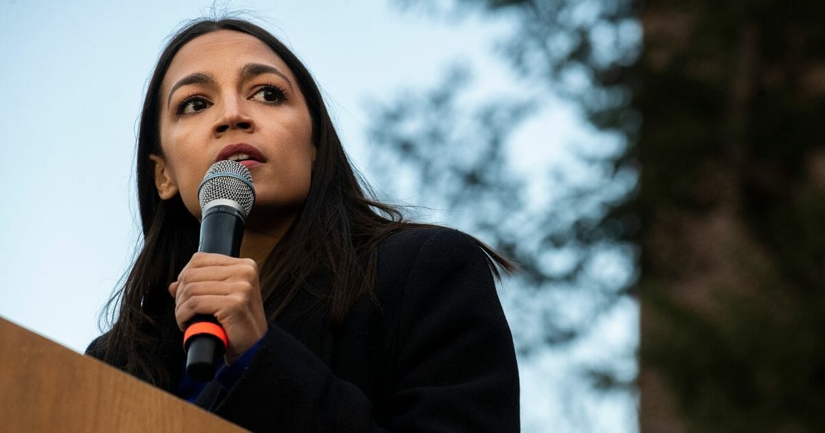 Rep. Alexandria Ocasio-Cortez (D-New York) addresses supporters during a campaign rally for Democratic presidential candidate Sen. Bernie Sanders on March 8, 2020, in Ann Arbor, Michigan.