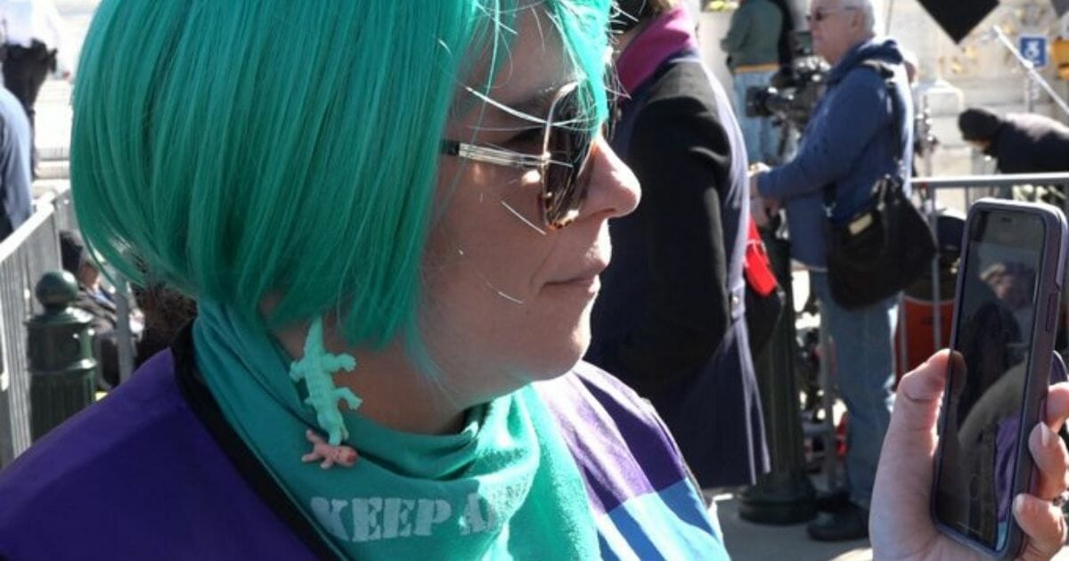 A woman wearing baby-killing croc earrings was apparently spotted at a pro-abortion rally on March 4, 2020.