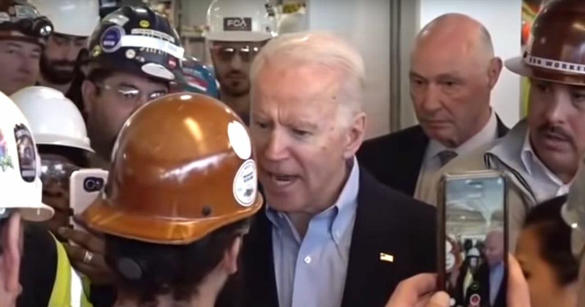 Democratic presidential candidate Joe Biden curses at autoworker Jerry Wayne during an appearance in Detroit.