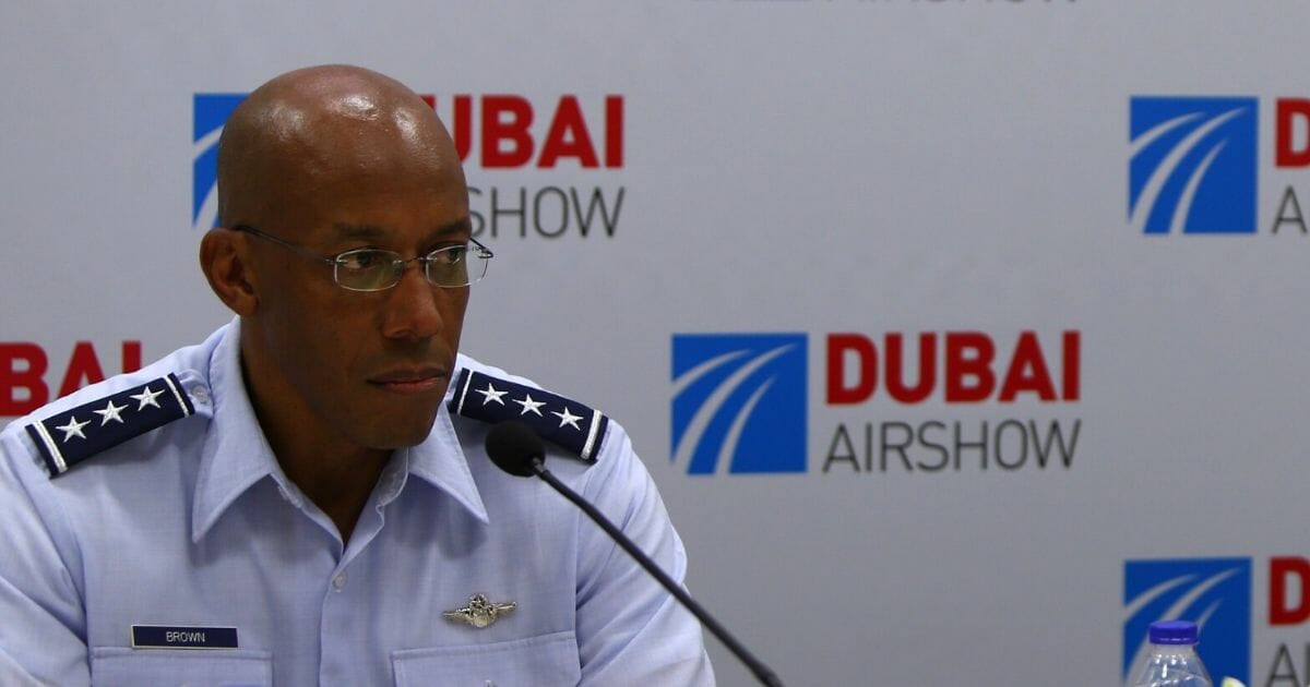 Then-Lt. Gen. Charles Q. Brown, commander of the U.S. Air Forces Central Command, Southwest Asia, listens on during a news conference at the Dubai Airshow on Nov. 10, 2015.