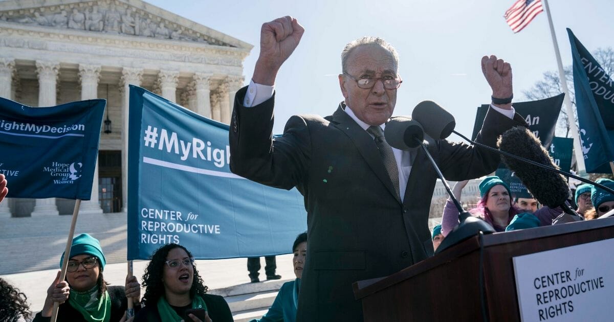 Senate Minority Leader Sen. Chuck Schumer (D-New York) speaks at an abortion rights rally outside of the Supreme Court as the justices hear oral arguments in the June Medical Services v. Russo case on March 4, 2020, in Washington, D.C.