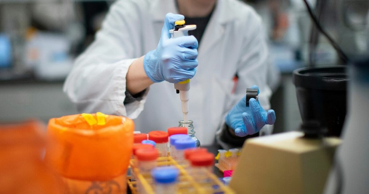 A researcher works in a lab that is developing testing for the COVID-19 coronavirus at Hackensack Meridian Health Center for Discovery and Innovation on Feb. 28, 2020, in Nutley, New Jersey.