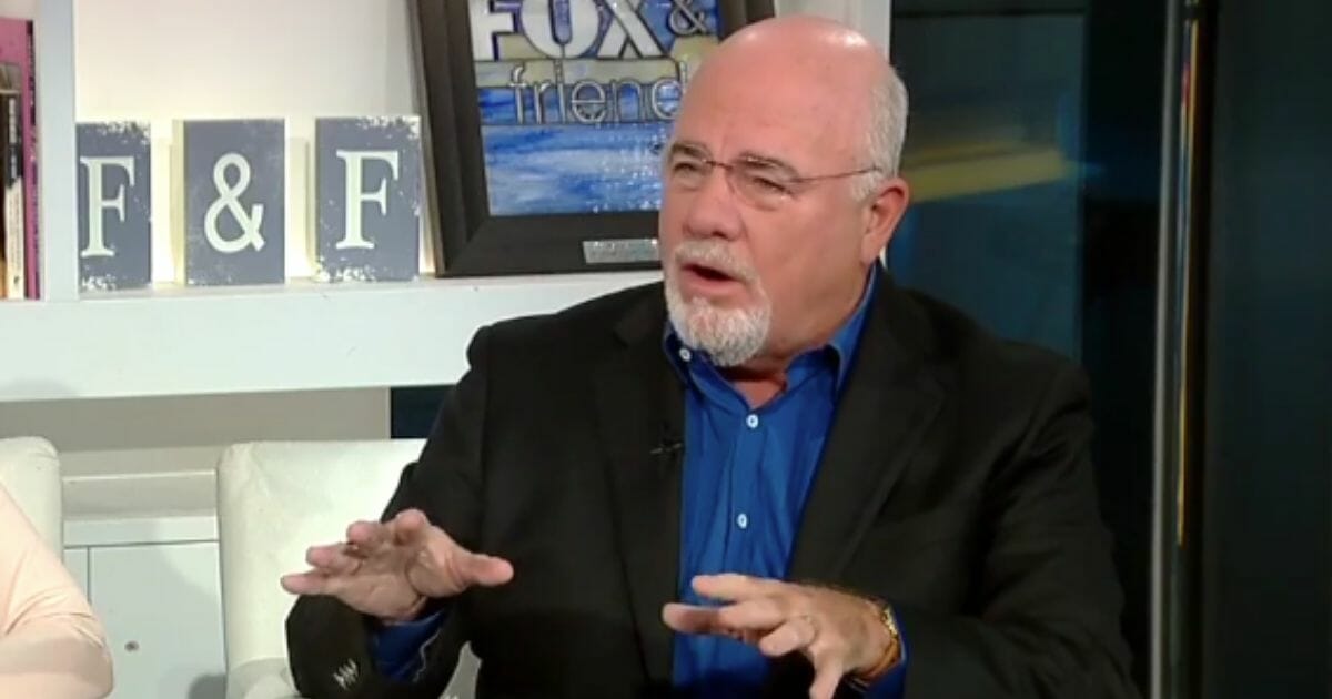 Financial expert Dave Ramsey told investors that they should not "get off a roller coaster in the middle of the ride" as they watch the stock markets fall after the World Health Organization declared the coronavirus a pandemic Wednesday.