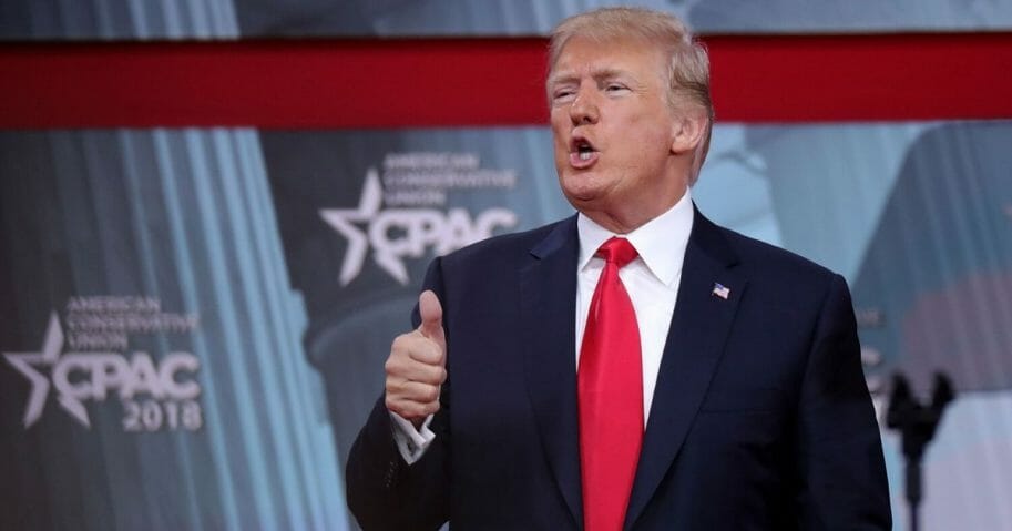 President Donald Trump gives a thumbs-up after addressing the Conservative Political Action Conference at the Gaylord National Resort and Convention Center on Feb. 23, 2018, in National Harbor, Maryland.