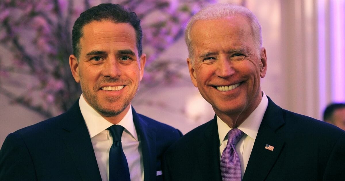 Then-Vice President Joe Biden, right, and his son, Hunter Biden, attend the World Food Program USA's Annual McGovern-Dole Leadership Award Ceremony at Organization of American States on April 12, 2016, in Washington, D.C.