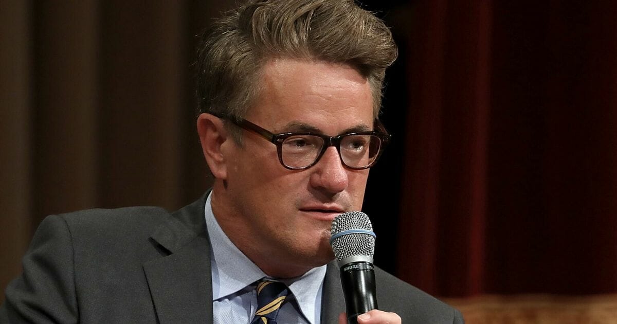 "Morning Joe" host Joe Scarborough speaks during a Harvard Kennedy School Institute of Politics event in the McGowan Theater at the National Archives in Washington on July 12, 2017.