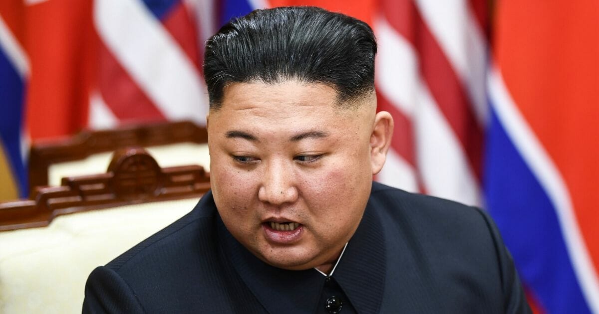 North Korean leader Kim Jong Un attends a meeting with President Donald Trump on June 30, 2019.