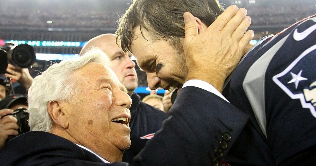 Quarterback Tom Brady celebrates with New England Patriots owner Robert Kraft after winning the AFC championship game against the Jacksonville Jaguars on Jan. 21, 2018, at Gillette Stadium.