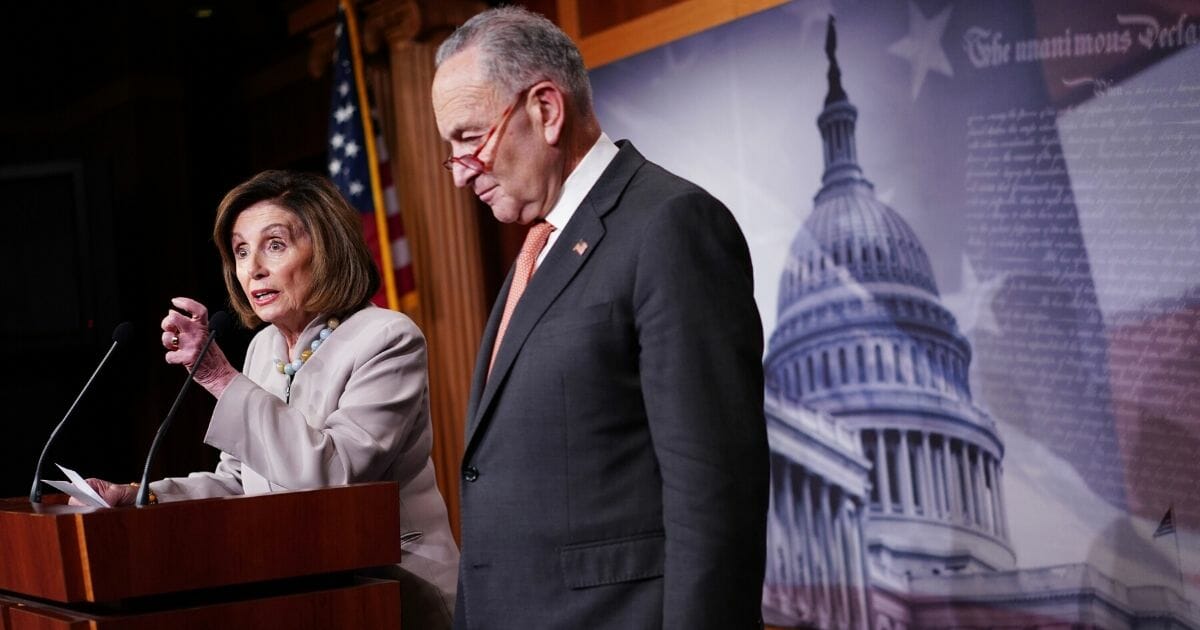 House Speaker Nancy Pelosi (D-California), left, and Senate Minority Leader Chuck Schumer (D-New York) hold a news conference at the U.S. Capitol in Washington, D.C., on Feb. 11, 2020.