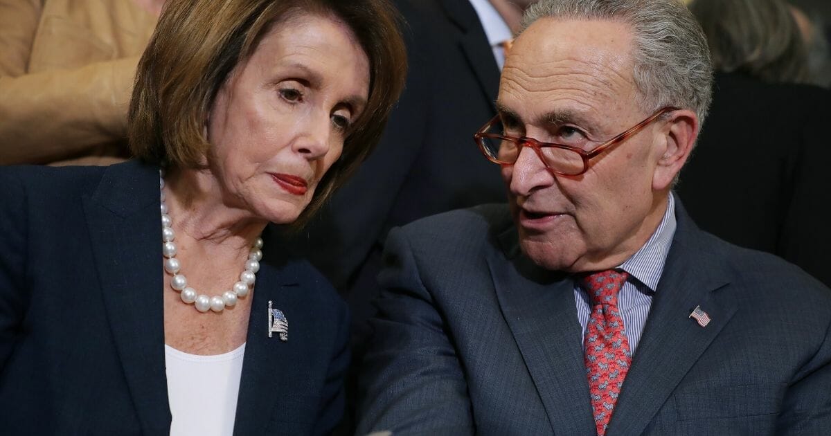 Speaker of the House Nancy Pelosi (D-California), left, and Senate Minority Leader Charles Schumer (D-New York) lead a rally and news conference ahead of a House vote on health care and prescription drug legislation in the Rayburn Room at the U.S. Capitol on May 15, 2019, in Washington, D.C.