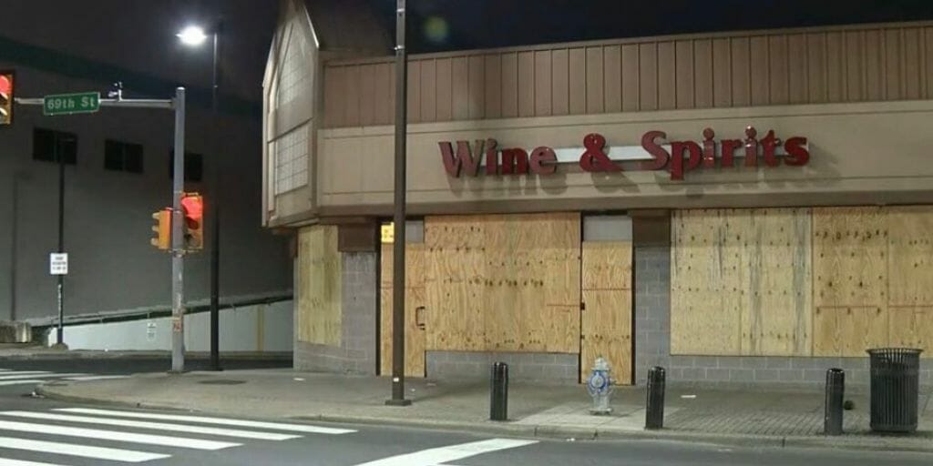 A Philadelphia store with barricaded windows, seen as coronavirus fear grips America.