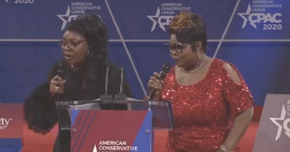 The pro-Trump duo known as Diamond and Silk speak to the Conservative Political Action Conference on Thursday outside Washington.