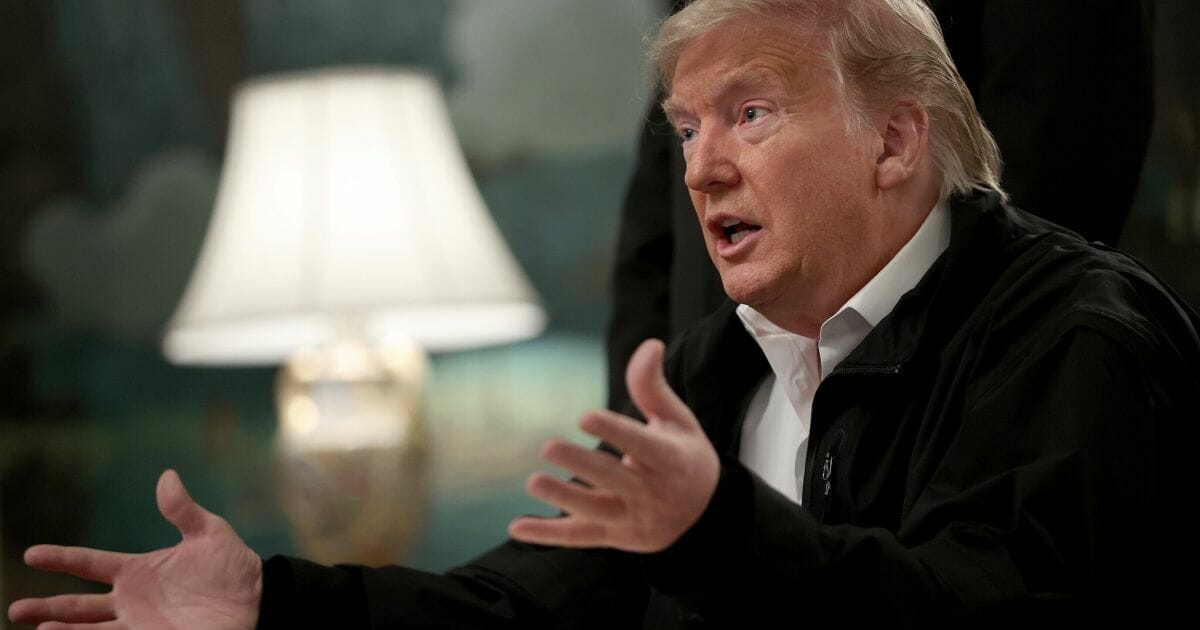 President Donald Trump answers questions after signing a bipartisan $8 billion funding bill at the White House to combat the coronavirus outbreak on March 6, 2020, in Washington, DC.