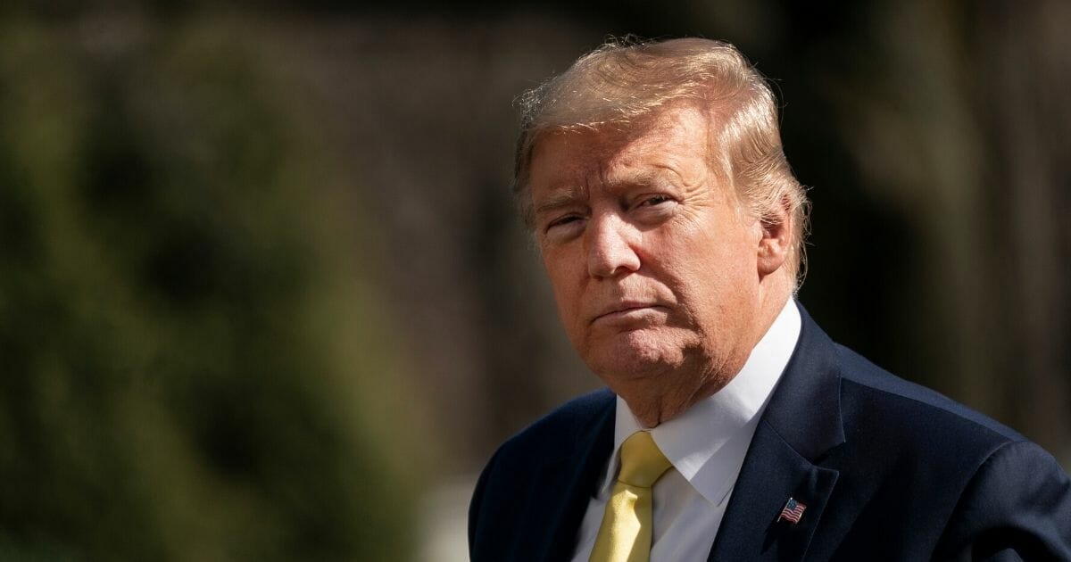 President Donald Trump walks toward the White House residence after exiting Marine One on the South Lawn of the White House on March 9, 2020, in Washington, D.C.