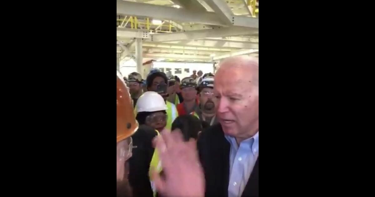 Democratic presidential candidate former Vice President Joe Biden argues with a Michigan auto worker about gun control.