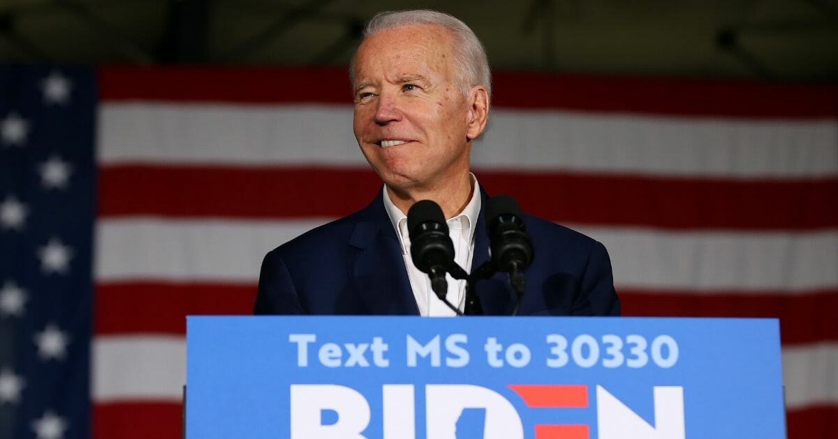 Former Vice President Joe Biden grins at the audience during a March 8 campaign stop in Tougaloo, Mississippi.