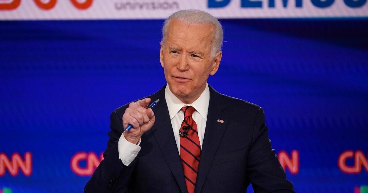 Former Vice President Joe Biden points his finger for emphasis while speaking during the March 15 Democratic presidential primary debate with Sen. Bernie Sanders.