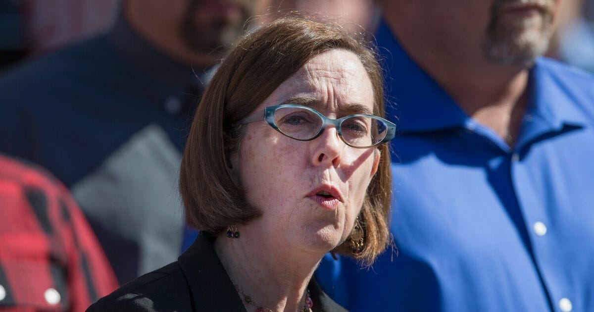 Oregon Gov. Kate Brown speaks to the media about the mass shooting at Umpqua Community College on Oct. 2, 2015, in Roseburg, Oregon.