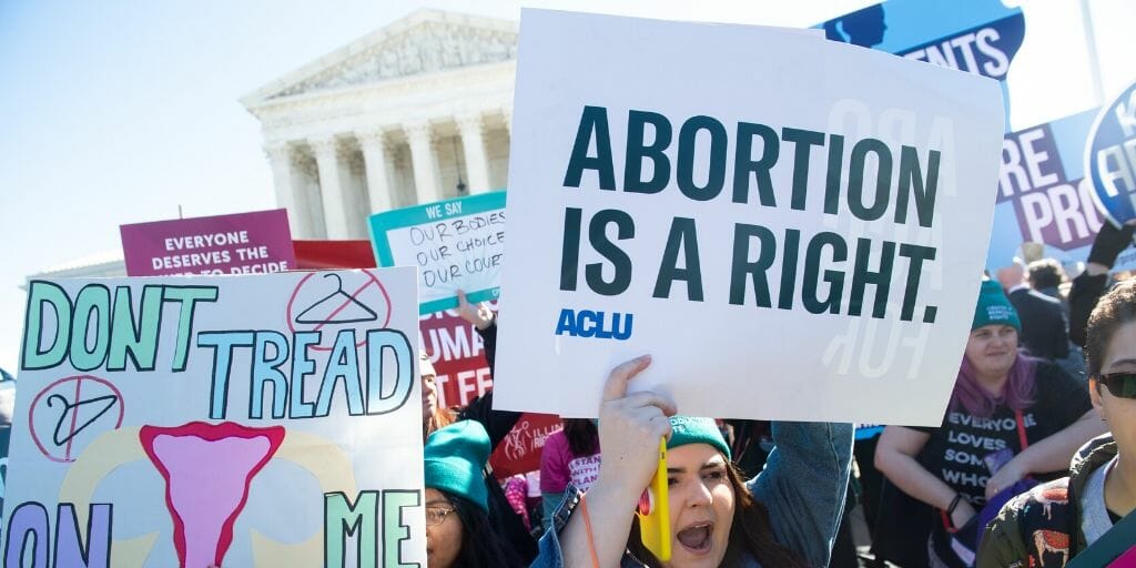 Pro-abortion activists supporting legal access to abortion protest during a demonstration outside the U.S. Supreme Court in Washington, D.C., on March 4, 2020, as the Court hears oral arguments regarding a Louisiana law about abortion access in the first major abortion case in years.