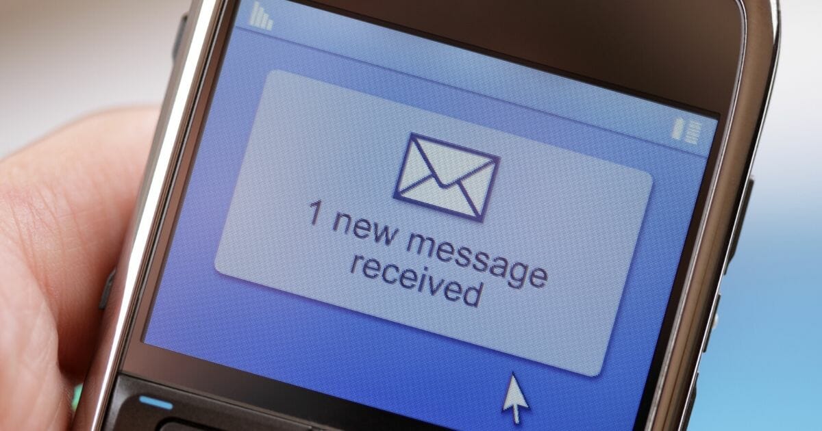 Stock image of a text message received on a mobile phone.