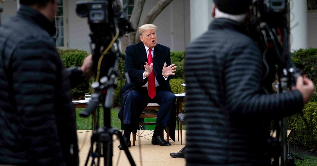 President Donald Trump participates in a Fox News virtual town hall with anchor Bill Hemmer in the Rose Garden of the White House on March 24, 2020.