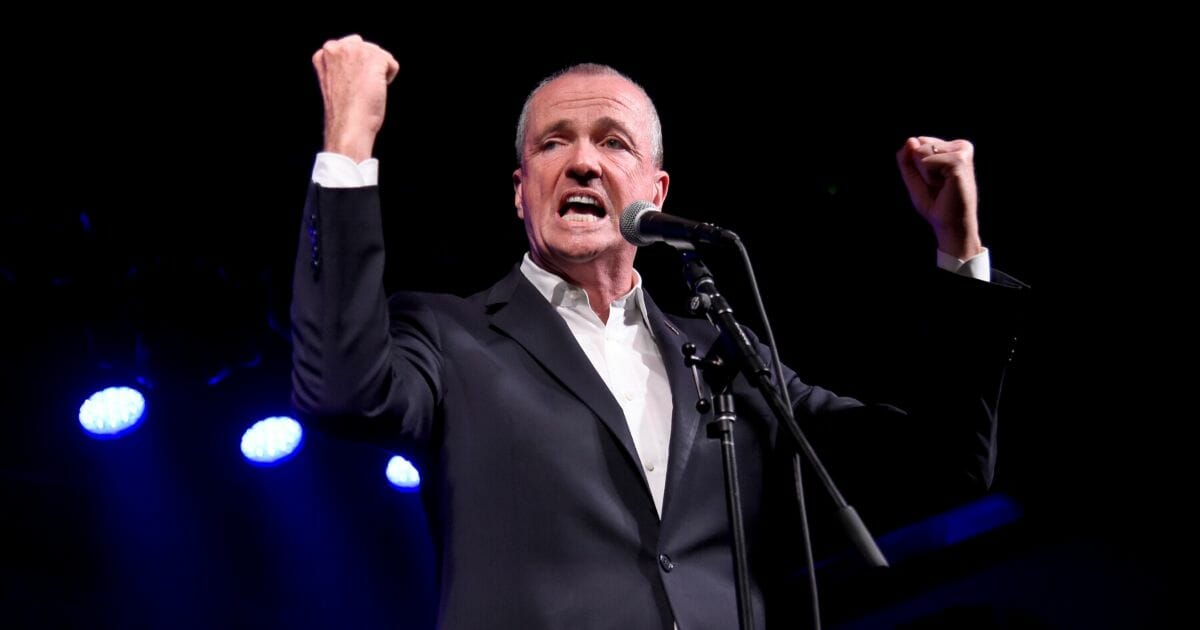 New Jersey Gov. Phil Murphy speaks onstage during the Grand Re-Opening of Asbury Lanes on June 18, 2018, in Asbury Park, New Jersey.